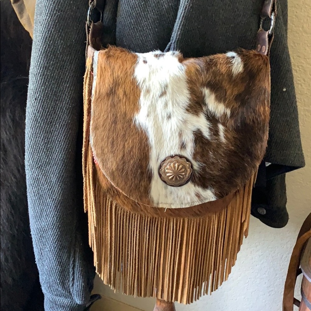 Handmade cowhide fringe handbag